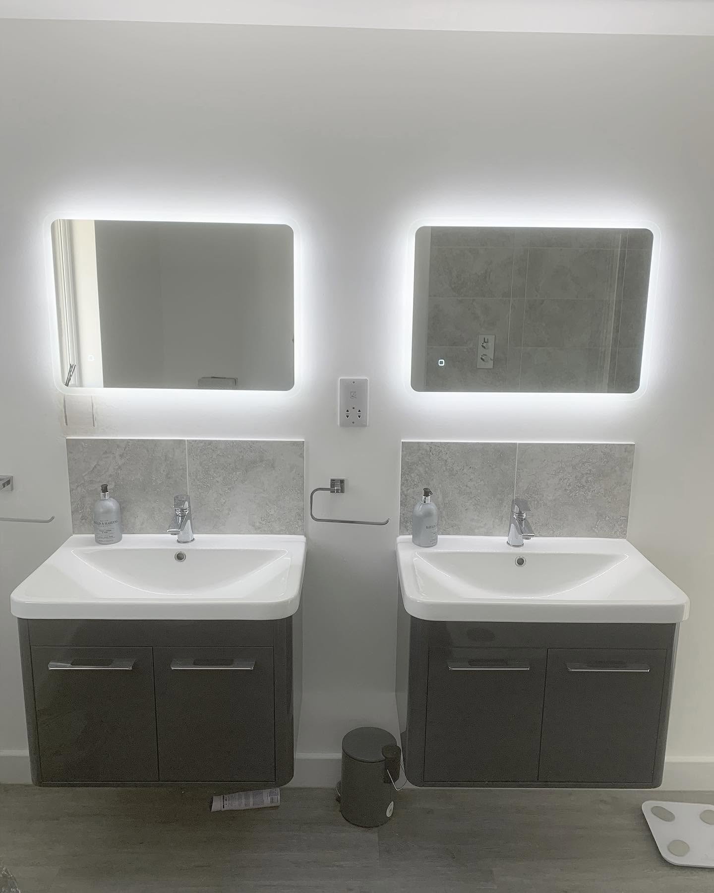 Backlit LED bathroom mirror installation